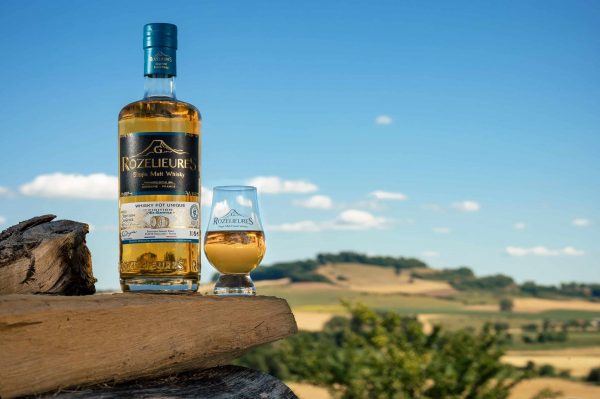 Bottle of Rozelieures Single Malt Whisky Fût Unique and whisky glass, French craft whisky from Lorraine