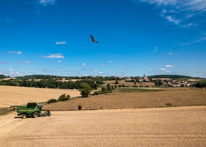 moisson-4 View of the village of Rozelieures in Lorraine, France, surrounded by fields and countryside where the distillery’s raw materials are grown.